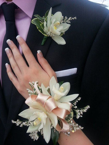 Cymbedium Orchid Corsage and Boutonniere - All About Flowers 