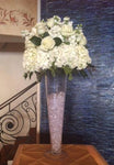 elevated arrangement of hydrangeas and roses 